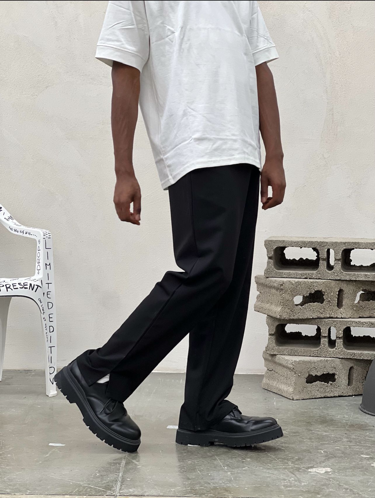 Pantaloni palazzo con spaccatura