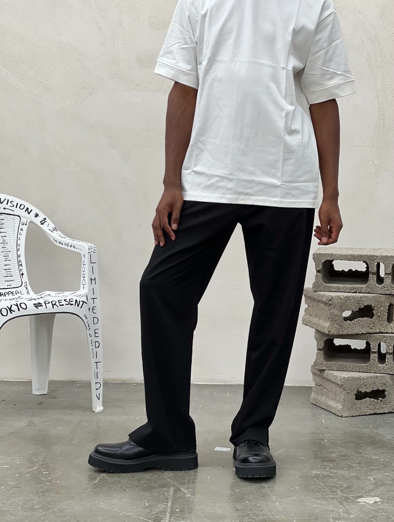 Pantaloni palazzo con spaccatura
